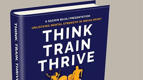 A graphic of Think.Train.Thrive. The book has a navy background with white text that reads Think.Train.Thrive.